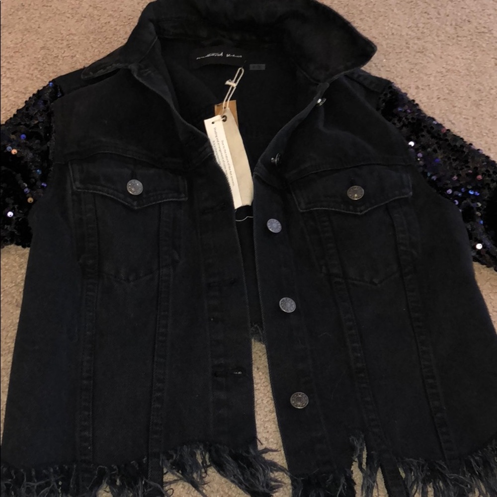 Black jean jacket with shimmery sleeves